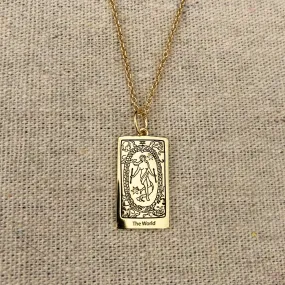 The World Tarot Charm on a necklace