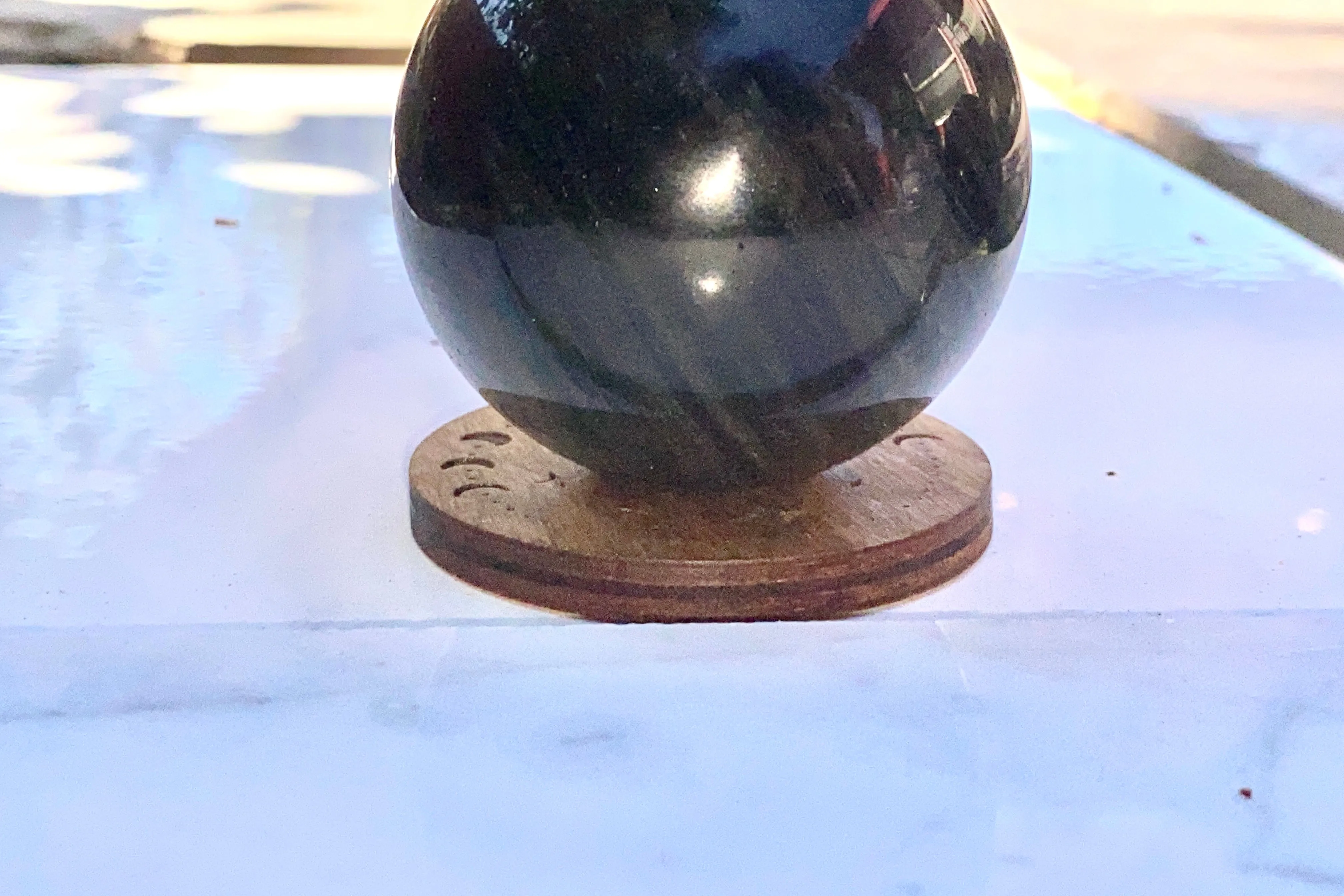 Wooden stand for gemstone sphere, crystal ball